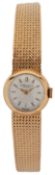 IWC, a lady's 18ct gold wrist watch, the circular brushed metallic dial with baton indicators, to