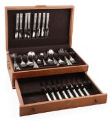 An Elizabeth II canteen of silver cutlery for eight by Gee & Holmes, comprising soup spoons, dessert