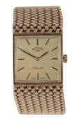 A 1970's 9ct gold Rotary manual wind bracelet dress wrist watch, with square dial and baton