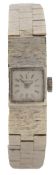 Bueche-Girod, a lady's white gold wristwatch, circa 1964, the square white dial with baton