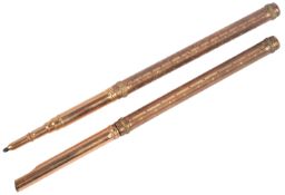 Retailed by Aucoc, a gold plated dip pen and pencil, AW Faber, circa 1900, each handle of reed and