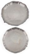 A George V silver salver by Jay, Richard Attenborough & Co Ltd, with gadrooned border, on three claw