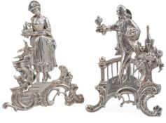 A pair of Edwardian Hanau silver menu holders by Berthold Muller, modelled as a gentleman next to