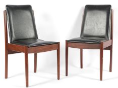 A pair of mid-century Danish design side chairs, 1960s, each with a padded rectangular back and