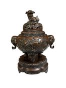 A Chinese bronze censor and cover on stand, total height 22cm.