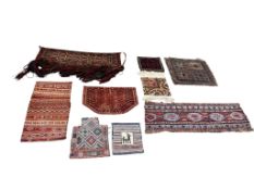 A quantity of rug remnants, panels, etc, largest 78 x 57cm
