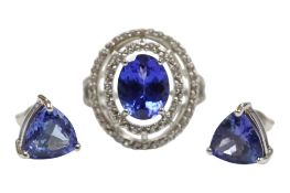 A recent 9ct white gold, tanzanite and white sapphire ring set oval cluster ring, size N and a
