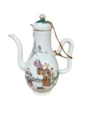 A Chinese porcelain water dropper and cover, decorated with figures, 16cm high
