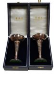 A pair of Elizabeth II silver tulip vases, by Garrard & Co, Sheffield, 1994, weighted, 14.9cm,