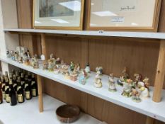 A large collection of mainly Beswick and Royal Doulton Beatrix Potter figures to include ‘Knitting’,