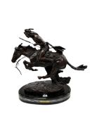 After Frederic S. Remington (American, 1861–1909) “Cheyenne” a dark patinated bronze depicting a