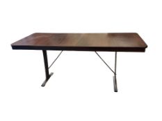 A mahogany dining table on an industrial style metal base, length 180cm, width 76cm, height 77cm