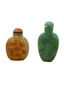 A Chinese agate snuff bottle and an agate example, both with stoppers, largest 7cm high