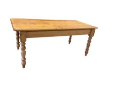 A modern pine farmhouse table, width 182cm, depth 88cm, height 77cm and eight beech Windsor