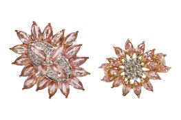 A recent 9ct gold, orangey-pink sapphire and diamond set oval cluster dress ring, size N and one