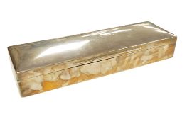 A George V silver mounted rectangular cigarette box, maker possible Cohen & Charles, marks rubbed,