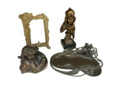 A group of four Art Nouveau-style decorative items: a resin bust after 'Carmela' by Emmanuel