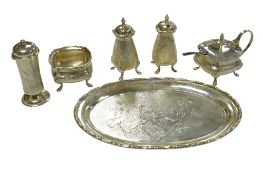 A Chinese Export sterling four piece condiment set on oval tray, by Wai Kee, Hong Kong, tray