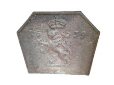 A Continental cast iron ‘crowned triumphant lion’ fireback, bearing date 1639, width 59cm, height