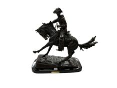 After Frederic S. Remington (American, 1861–1909) “Cowboy” a dark patinated bronze, the rider with