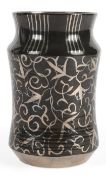 Louise Powell (1882-1956) for Wedgwood: A silver lustre decorated jar, of albarello form, painted in