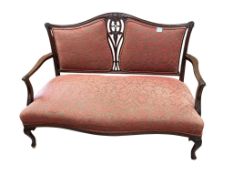 A late Victorian mahogany settee, width 126cm, depth 65cm, height 90cm