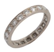 A diamond eternity ring, early 20th century, set with a continuous line of circular-cut diamonds