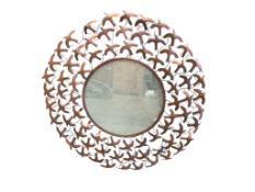A circular contemporary copper coloured mirror with flying bird border, diameter 100cm
