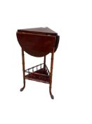 A late Victorian mahogany drop leaf occasional table with lobed circular top on faux bamboo