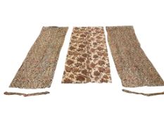 A pair of autumnal coloured chintz curtains, a stylistic pair of bird and floral linen curtains,