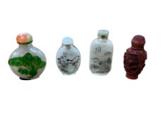Four Chinese snuff bottles to include a cinnabar lacquer example and two internally painted glass