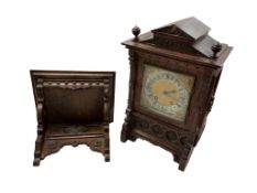 An early 20th century German oak bracket clock with silvered and gilt dial, striking on a coiled