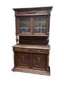 A 19th century French carved oak Buffet, with original panels, width 138cm, depth 57cm, height