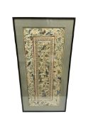 An Uzbek Lakai silk embroidery, within mount 65 x 26cm, overall 78 x 38cm.
