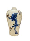A Chinese blue and white crackle glaze ‘chilong’ meiping, 19th century, 23cm high