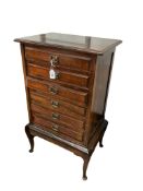 A late Victorian mahogany music cabinet, width 52cm, depth 37cm, height 88cm
