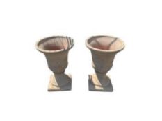 A pair of terracotta urns, diameter 37cm, height 53cm