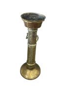 A 19th century Indo-Persian engraved brass mosque lamp base, height 96cm