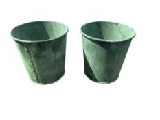 A pair of large circular faux copper planters, diameter 60cm, height 63cm