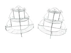 A pair of demi lune painted metal three tier plant stands, width 96cm, depth 50cm, height 86cm