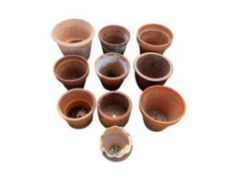 Sixteen assorted terracotta garden pots