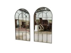 A pair of industrial style arched window frame style mirrors, width 102cm, height 196cm