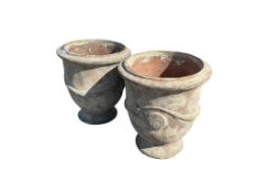 A pair of large circular Anduze terracotta urns with swagged bodies, diameter 62cm, height 68cm