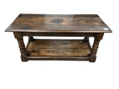 An oak rectangular topped oak two tier coffee table, width 98cm, depth 44cm, height 43cm