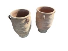 A pair of amphora-shaped circular terracotta garden urns, diameter 39cm, height 62cm