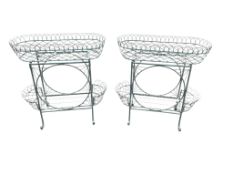A pair of two tier painted wirework pot stands, width 76cm, depth 30cm, height 80cm