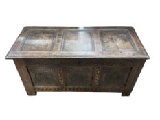 An 18th century oak coffer, width 122cm, depth 52cm, height 59cm