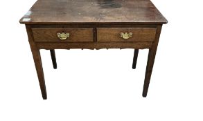 A George III oak two drawer side table, width 89cm, depth 43cm, height 71cm