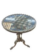 A Victorian circular cream painted tripod chess top table, diameter 59cm, height 69cm