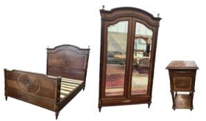 A French Louis XVI style mahogany and gilt metal mounted suite of bedroom furniture comprising doubl